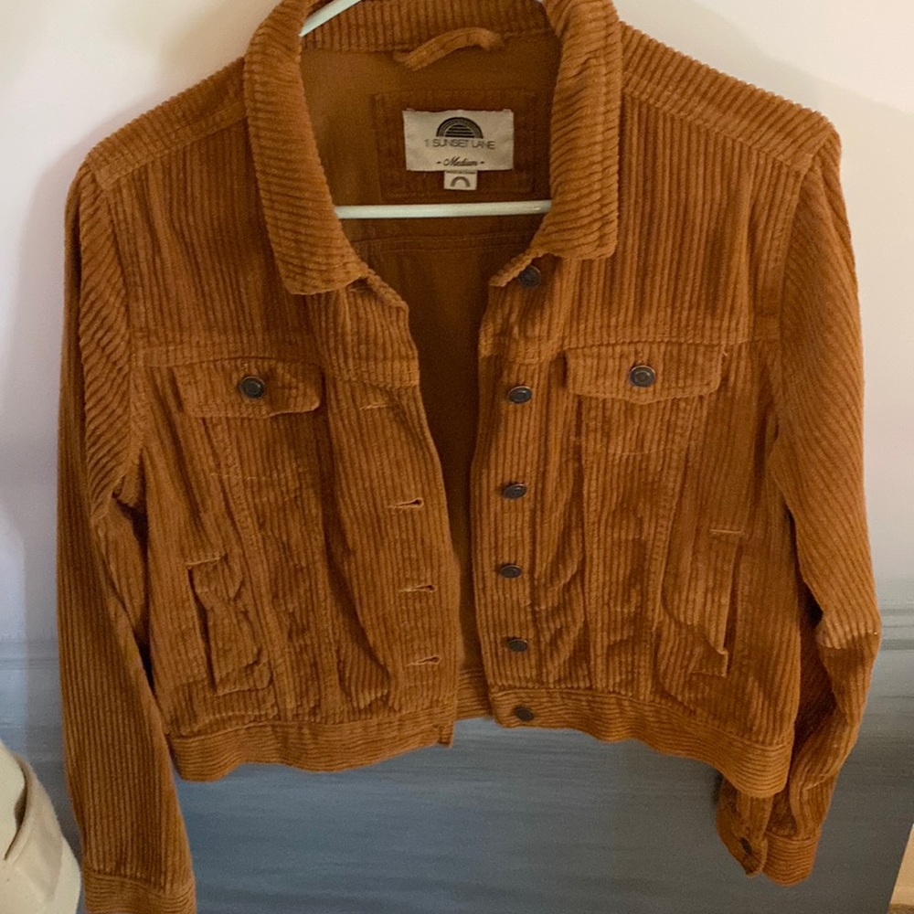 Burnt orange corduroy jacket.